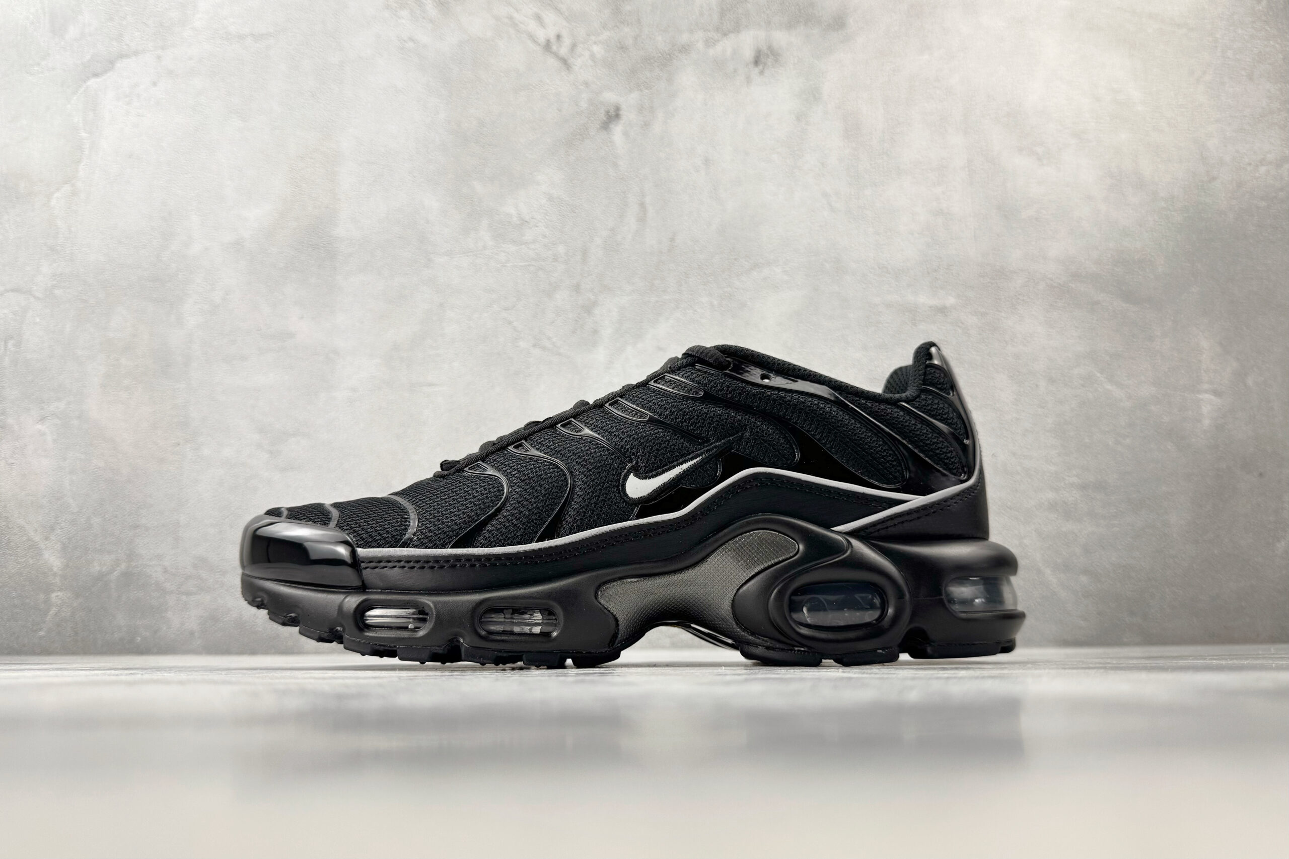 Nike Air Max Plus Black and White Swoosh
